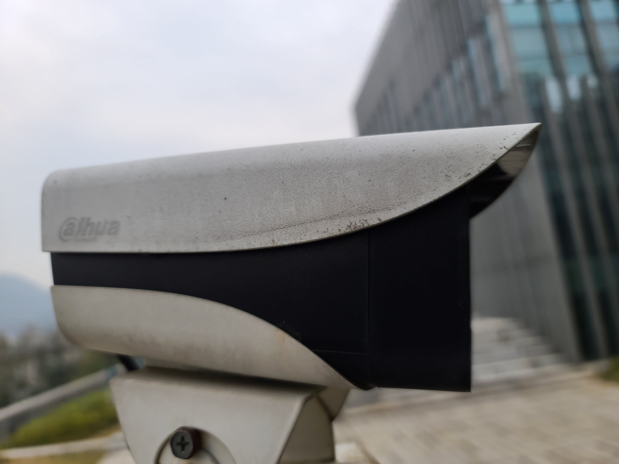 Municipal CCTV housing: before — dust and grime
